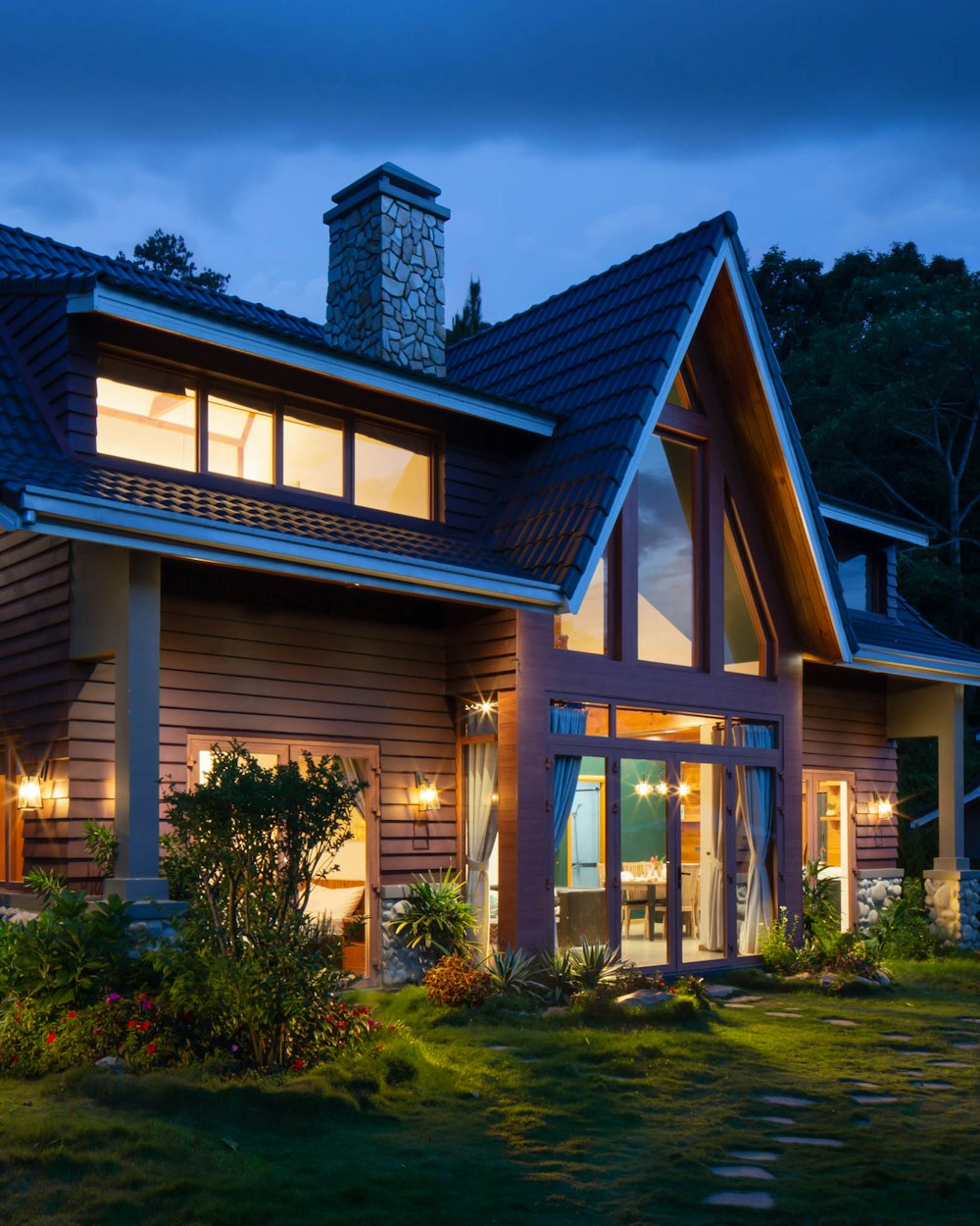 Warm family home exterior at dusk